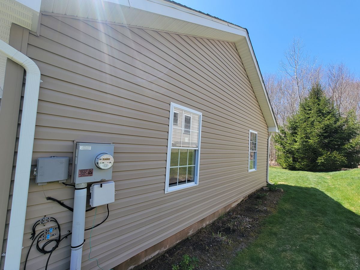 House exterior after washing - clean siding