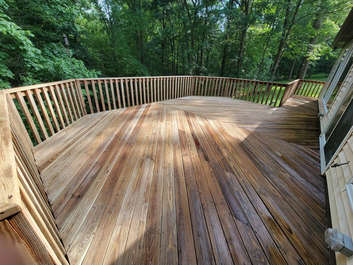 Beautifully restored deck after pressure washing