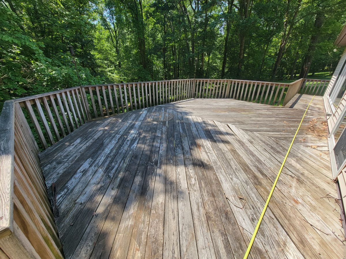 Deck before pressure washing - gray weathered wood