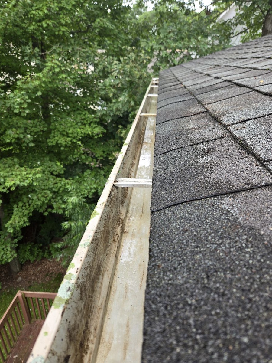 Gutter cleaned and cleared of all debris